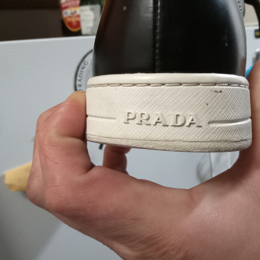 Prada Black Sneakers with Glossy Finish and Metallic Accents - Picture 4 of 7